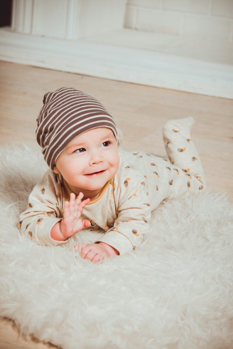 Photo by Victoria Akvarel : https://www.pexels.com/photo/smiling-baby-lying-on-white-mat-1648377/